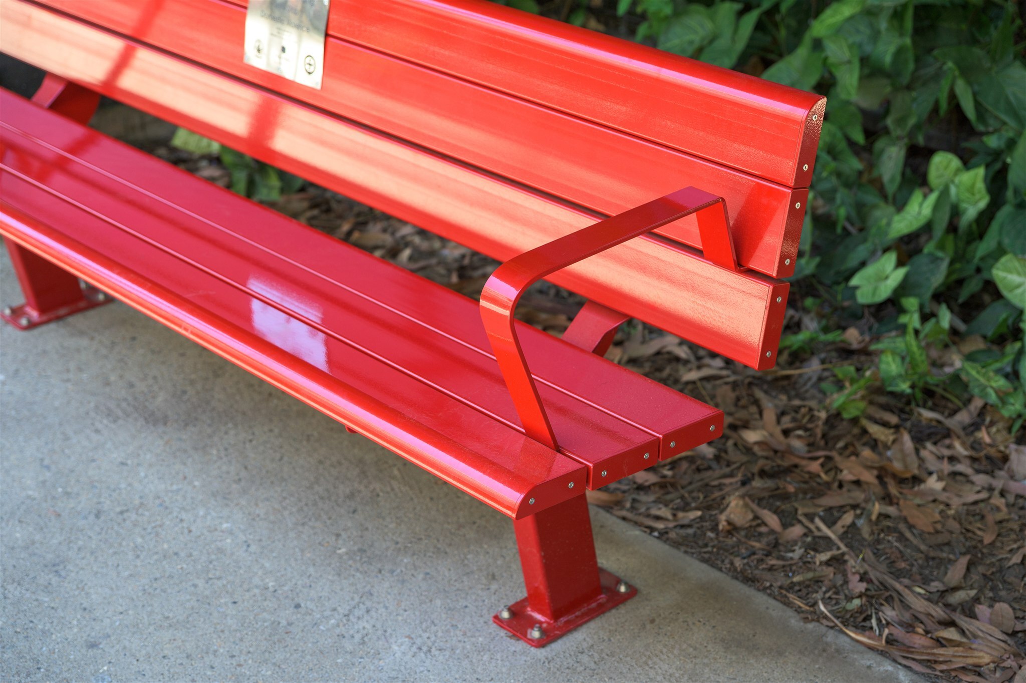 Ferny Grove State High School Red Bench Project featuring GX Outdoors Integra Ex Park Seat installed at the school campus