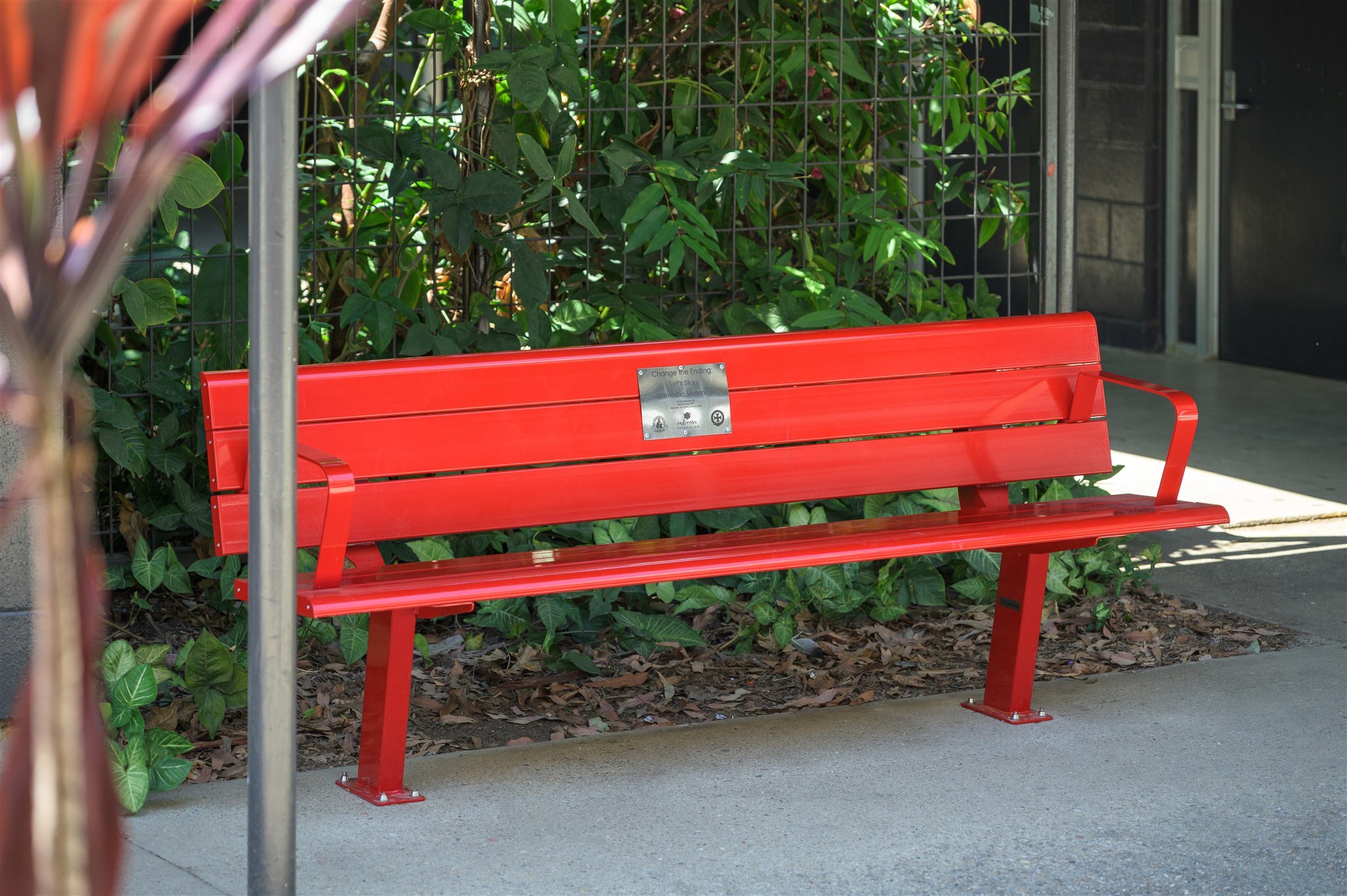 Ferny Grove State High School Red Bench Project featuring GX Outdoors Integra Ex Park Seat installed at the school campus